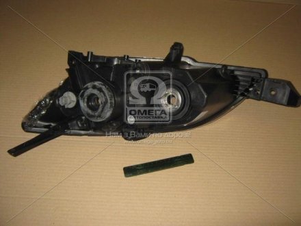 20-A859-05-2B TYC Фара пра. MAZDA 3 HB 04- (вір-во TYC)